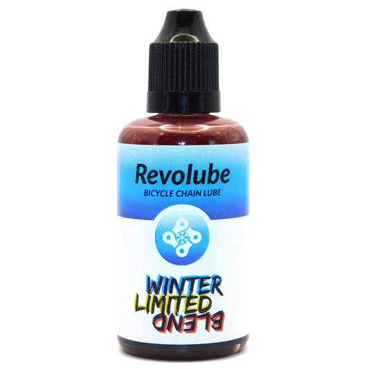 A 50ml plastic bottle of Revolubes Bicycle Chain Lube in Limited Winter Blend variant, designed for maximum drivetrain protection in winter conditions, displayed against a white background.